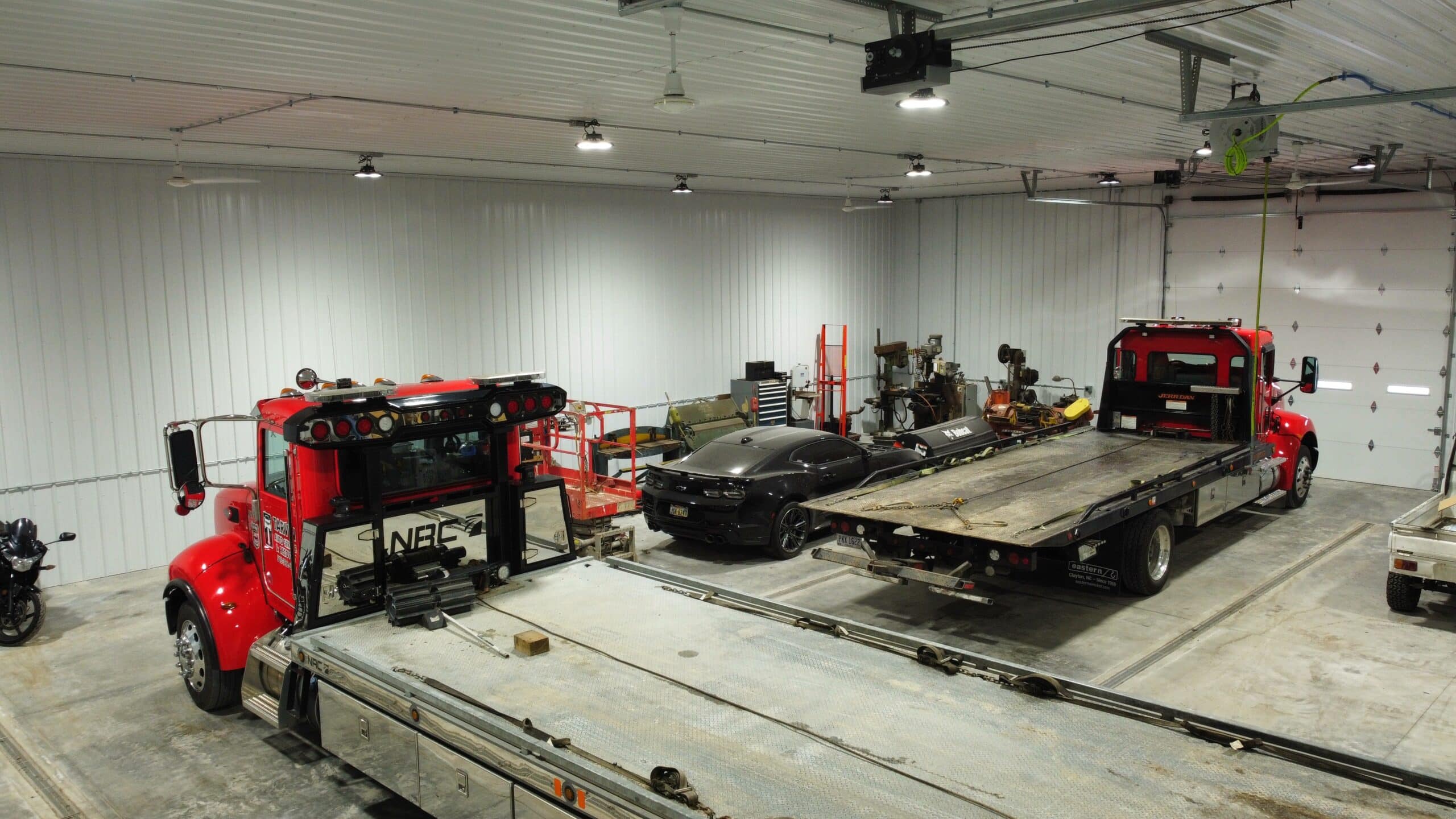Vehicles being stored in a 80x120 commercial pole barn