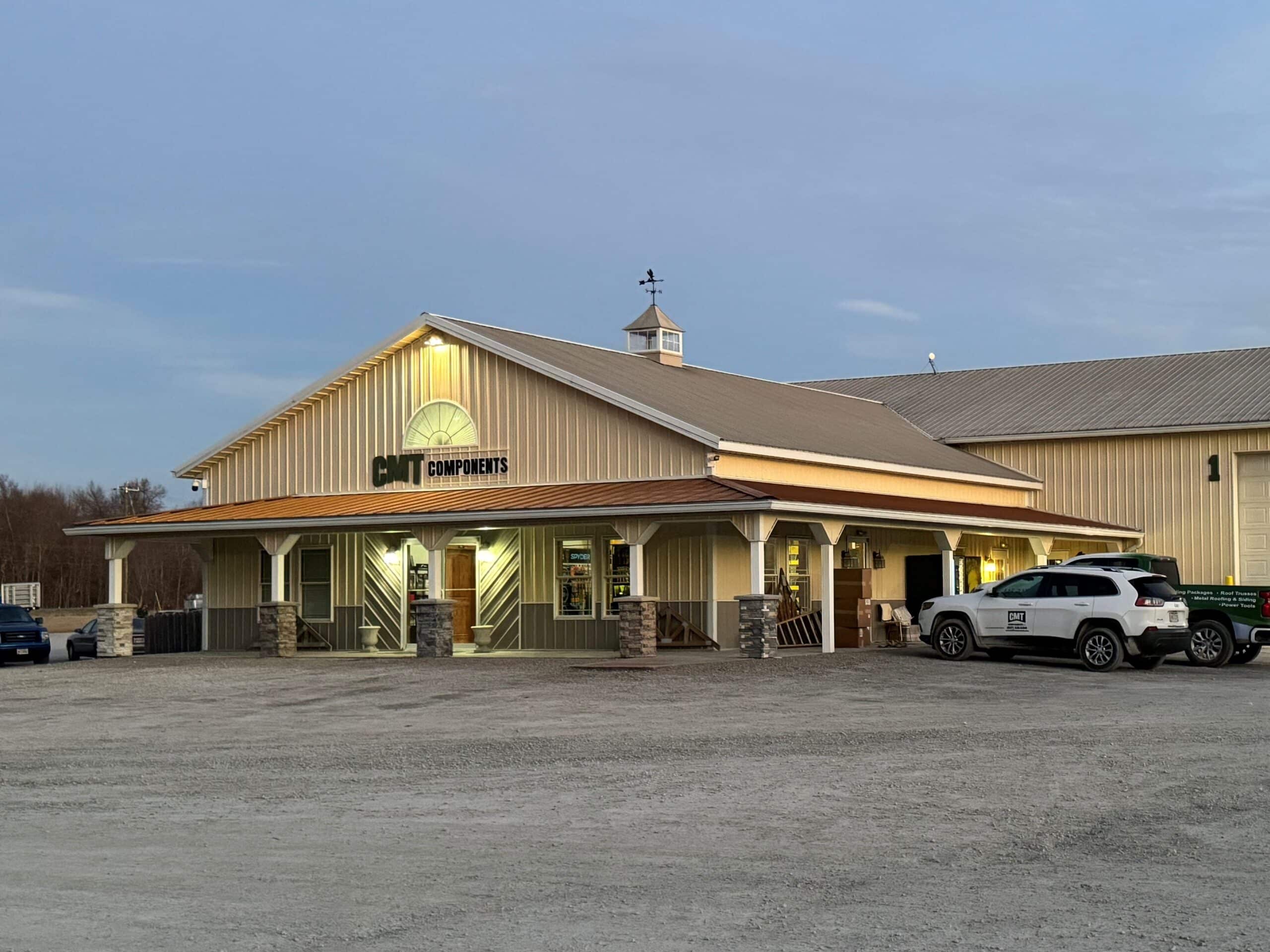 CMT Components building with lights on in dark