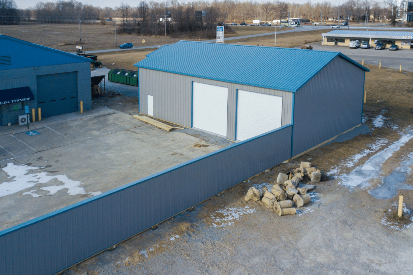 grey with blue roof and two garages 40x40 commercial pole barn kit in oh