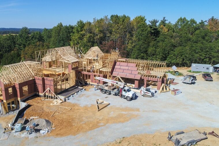 contractors working on a home in Winchester OH using building materials from CMT components