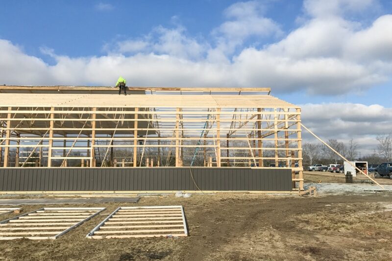 gray pole barn being constructed by contractors in West Union OH