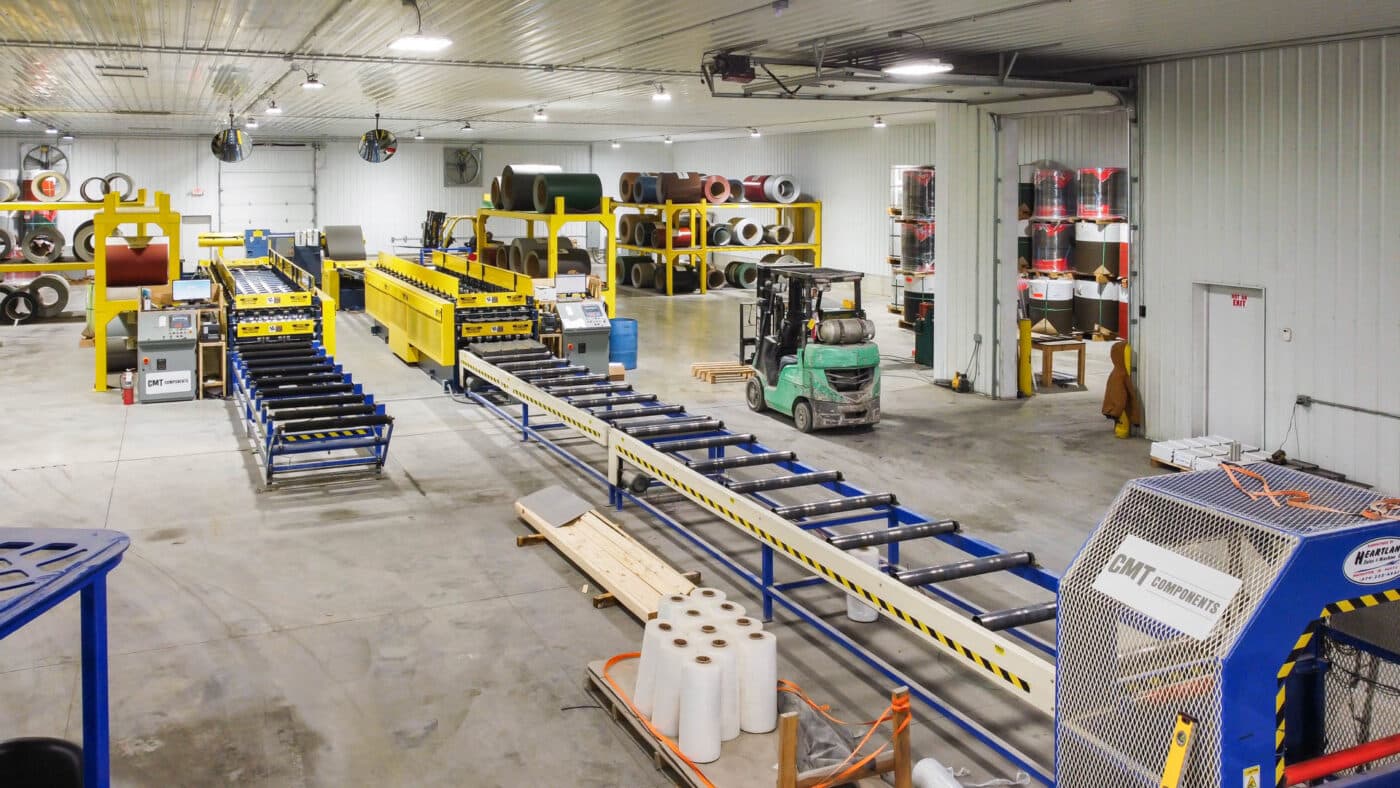 metal panel manufacturing machines that are blue and yellow