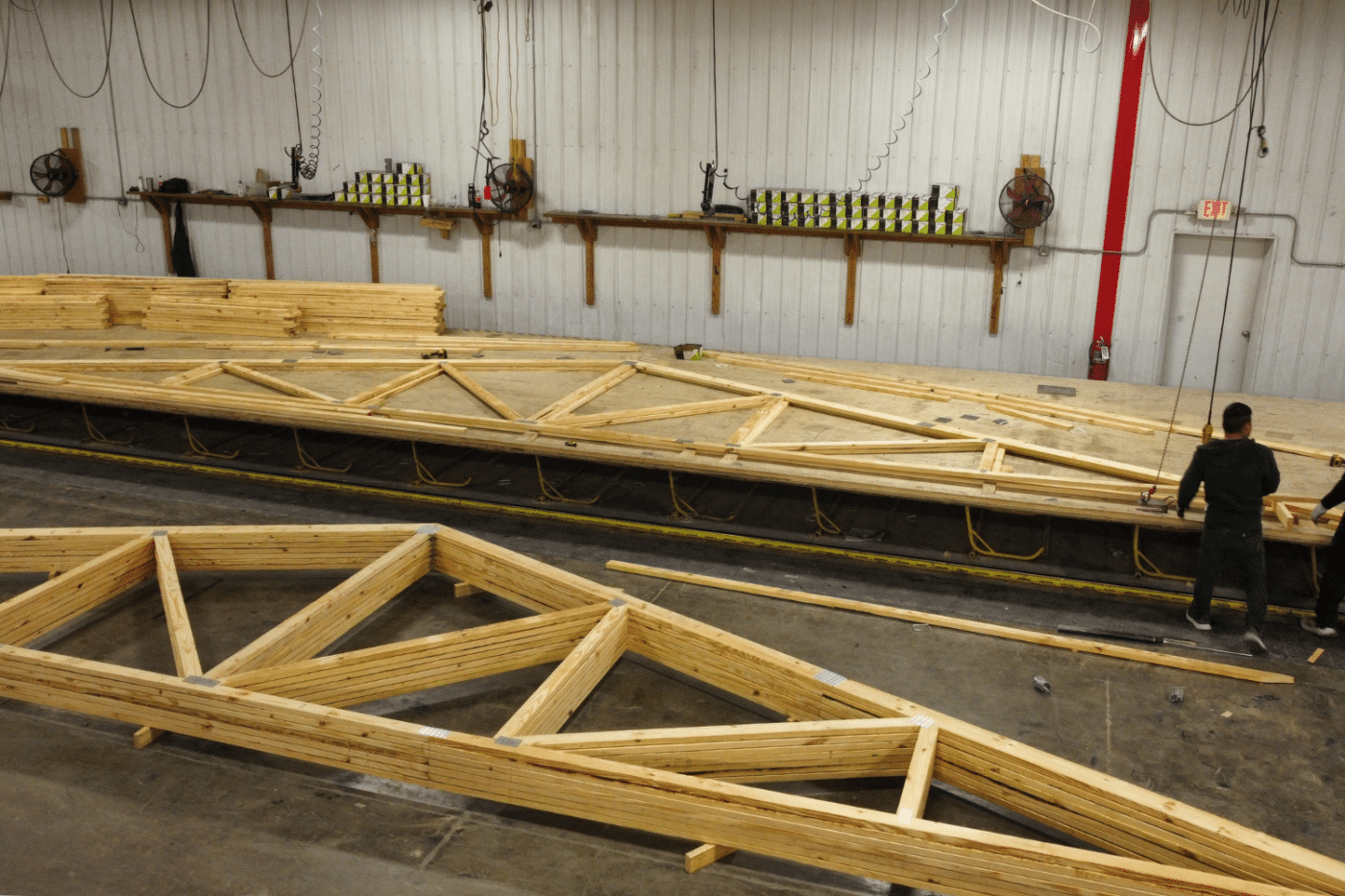 roof trusses being constructed for 20x50 garage pole barn kit