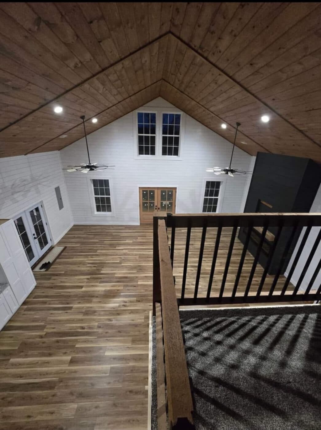 stairs in 30x60 barndominium in williamsburg ohio with fireplace