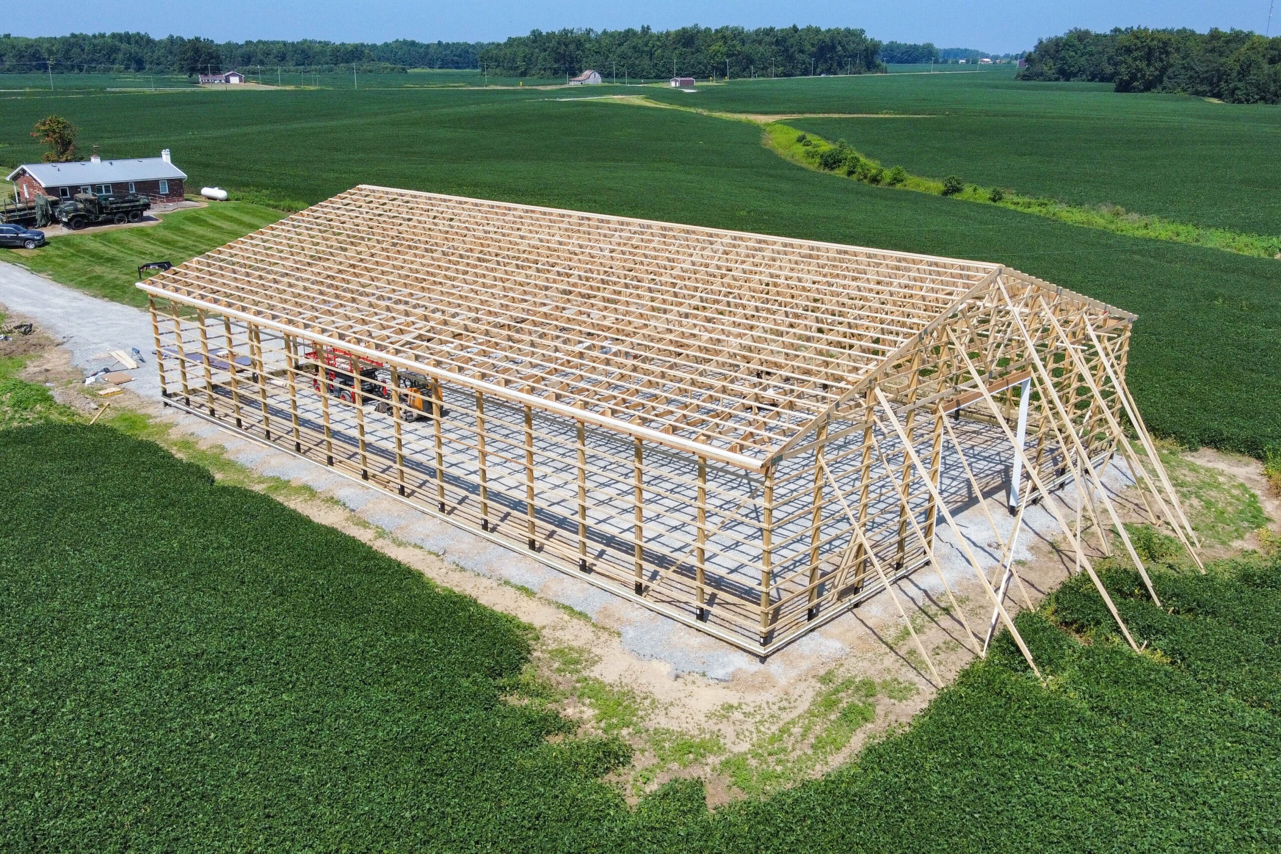 wooden frame of an agricultural pole barn