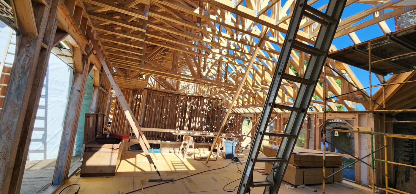 wooden roof trusses being installed