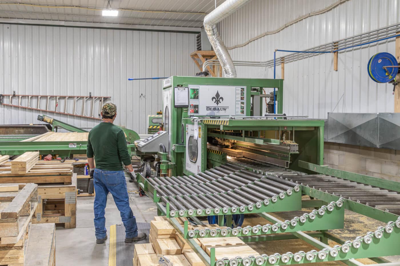 wooden roof trusses being manufactured at green machine
